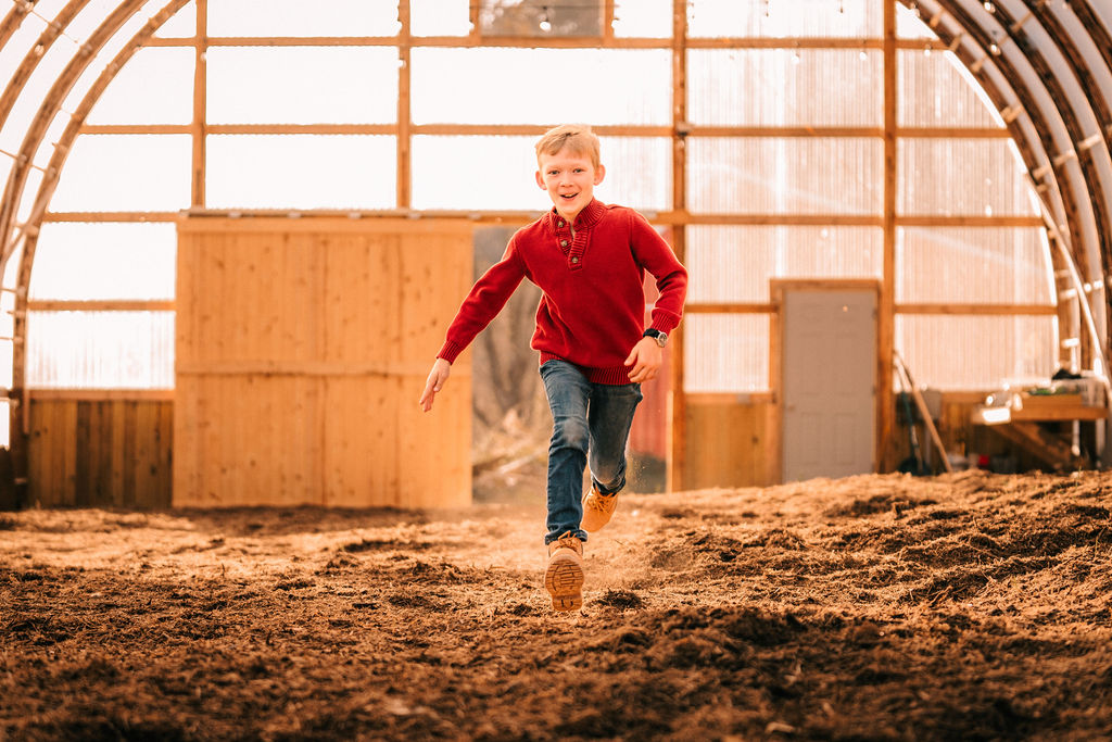 Emmons running in the Cassell Hollow Farm high tunnel
