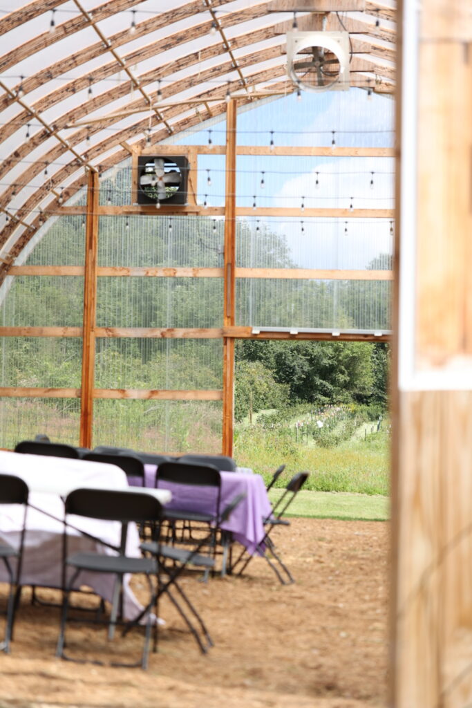 A look inside the high tunnel at Cassell Hollow Farm when set up to host a gathering